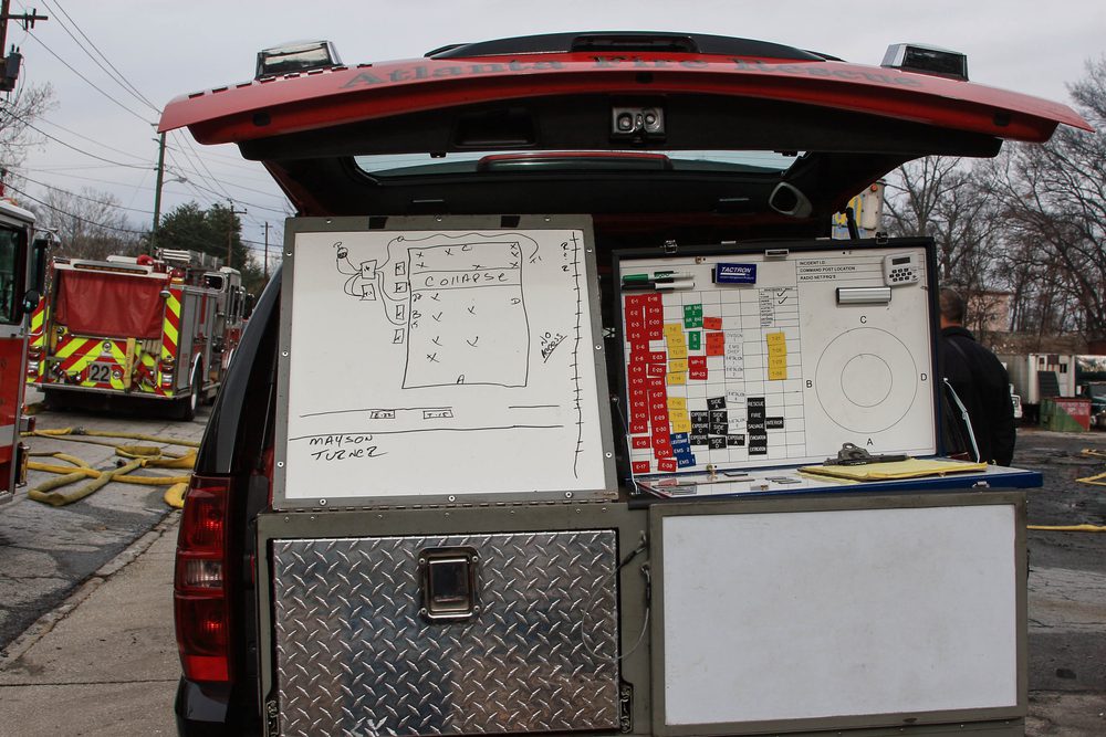 back of fire truck with incident command white boards